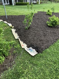 the garden is ready to be planted with mulchs and composting paper