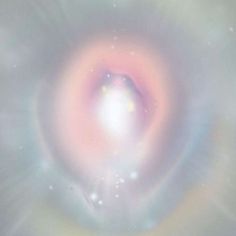 an image of a white and pink object in the sky