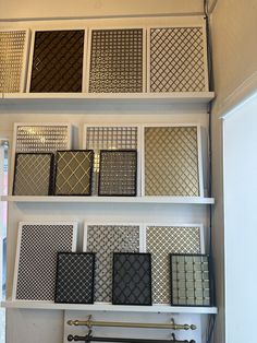 the shelves are filled with different types of tile