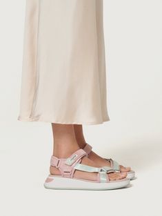 Inspired by the sunsets of MARTINIQUE island. These sandals are designed to be the must-have for sunny days, thanks to the blend of pastel tones in pink and green. Their details and materials in suede, synthetic, and textile not only make them a unique piece but are also synonymous with comfort due to the memory foam insole and padded lining. Perfect for walking and pairing with your favorite jeans or dresses. Remember that these sandals are not made to get wet. Sole height: 5 cm. Pink Sport Sandals For Summer Beach, Pink Cushioned Sport Sandals For Spring, Casual Pink Sport Sandals For Summer, Pink Sport Sandals With Removable Insole For Vacation, Summer Vacation Pink Sport Sandals, Summer Sport Sandals In Pink For Vacation, Pink Open Toe Sport Sandals For Vacation, Pink Flat Sport Sandals For Summer, Pink Summer Sport Sandals For Vacation