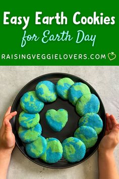 earth cookies on a plate with the words easy earth cookies for earth day written below