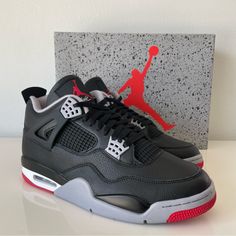 Brand New And In Original Box, Never Worn. 100% Authentic, Proof Of Purchase Available. Brand: Air Jordan Size: M 12 Color: Black/Cement Grey/Summit White/Fire Red The Air Jordan 4 Retro 'Bred Reimagined' Makes Over The Iconic Silhouette With A Black Leather Upper, Replacing The Nubuck Material Of The Original 1989 Release. Heritage Details Include Quarter Panel Netting, Grey Molded Eyelets, And Nike Air Branding On The Heel Tab. Atop The Tongue, A Woven Flight Tag Displays A Crimson Jumpman Log Air Jordan 4 Black With Air Cushioning For Sports, Black Air Jordan 4 With Air Cushioning For Sports, Casual Black Air Jordan 4 With Air Cushioning, Black Air Jordan 4 High-top With Air Cushioning, Black High-top Air Jordan 4 With Air Cushioning, Air Jordan 4 Cushioned Streetwear Sneakers, Air Jordan 4 Streetwear With Cushioned Footbed, Air Jordan 4 Synthetic With Cushioned Footbed For Streetwear, Sporty Air Jordan 4 With Air Max Cushioning