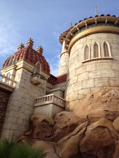 a large castle like building on top of a mountain