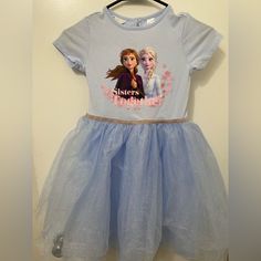 Nwot Disney/H&M Elsa Dress With Chiffon Bottom. In Excellent Condition. Never Worn. Girls Size 8/10 Comes From Smoke Free/Pet Free Home Blue Short Sleeve Cute Princess Dress, Disney Style Short Sleeve Spring Dresses, Cute Blue Princess Dress With Short Sleeves, Blue Princess Dress With Short Sleeves For Dress-up, Spring Disney Short Sleeve Dresses, Blue Fitted Disney Dress, Blue Short Sleeve Princess Dress For Dress-up, Disney Elsa Dress, Disney Princess Dresses For Kids Elsa