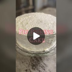 a cake sitting on top of a counter next to a glass container with the words pickling cake