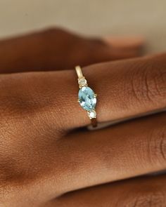 DetailsMaterial: 14k/18k GoldColor Options: Yellow Gold, White Gold, Rose Gold★ Center StoneAquamarine, OvalSize: 5 x 7 mmApprox Weight (Ct): 0.84★ Accent StonesDiamond, RoundSize: 2.5 mm * 2 Nos.Approx Weight (Ct): 0.1 Ring Redesign, Surf Jewelry, Ring Cuts, Ring Inspo, Future Engagement Rings, Gold Rings Simple, Design Accessories, Moonstone Engagement Ring, Natural Gemstone Jewelry