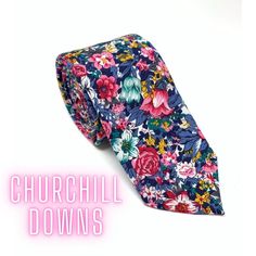 A lush bouquet of color is a perfect look for the Spring and Summer. This tie represents all the colors of the flowers you would see at the renowned Kentucky Derby. This is a skinny tie measuring 2 inches wide. Made out of cotton for the matte modern look.  Get tons of compliments when your tie stands out like this one! Multicolor Floral Print Wedding Ties, Floral Print Tie For Groom, Floral Print Standard Tie For Groom, Floral Print Ties For Groom, Floral Print Ties For The Groom, Mens Floral Tie, Floral Ties, Churchill Downs, Tie Men