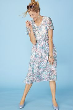 The beauty of georgette fabric is brought to life with this dress which features a flattering wrap design and bottom flounce. Flounce Hem Dress, Casual Tie, Georgette Fabric, Faux Wrap Dress