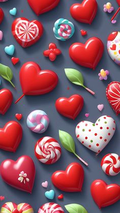 many different heart shaped candies and lollipops