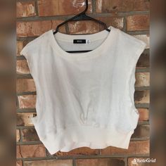 Bdg Urban Outfitters Women’s Cream Sleeveless Crop Top Size Large 100% Cotton New With Tags Armpit To Armpit 19 In Shoulder To Hem 16.5 In Summer Fitted Cropped Muscle Tee, Basic Sleeveless Crop Top For Everyday, Fitted Cropped Muscle Tee For Summer, Trendy Sleeveless Sweater Vest For Day Out, Cropped Muscle Tee For Everyday Summer Wear, Casual Everyday Sleeveless Crop Top, Casual Sleeveless Crop Top For Everyday, Summer Sleeveless Crop Top For Everyday, Summer Style Sleeveless Crop Top For Everyday