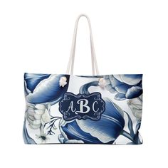 Step out in style with our "Personalized Blue Frame Toile Tote Bag," the ultimate accessory for those who adore a blend of classic charm and modern flair. This customizable large tote bag features an elegant blue and white floral toile pattern, reminiscent of French country aesthetics, that will turn heads and start conversations. Key Features: *Customizable Text: Add a personal touch with your chosen text, elegantly framed in a sophisticated blue border. *Spacious & Sturdy: Generously sized to Classic Blue Rectangular Bag, Elegant Blue Gift Bag, Classic Blue Bag With Large Capacity, Classic Large Capacity Blue Bag, Blue Monogram Bags For Everyday Use, Blue Monogram Bag For Everyday Use, Rectangular Monogram Bag For Daily Use, Elegant Monogram Bags For Daily Use, Rectangular Monogram Travel Bag