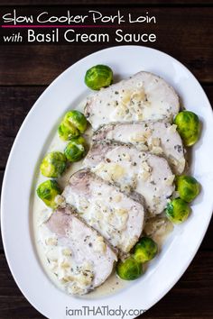 a white plate topped with chicken and brussel sprouts