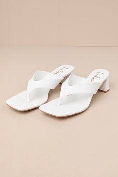 Dressing for sunny days should be simple, and that is why you'll reach for the Lulus Cachia White High Heel Thong Sandals for easy style this season! These fun summer sandals feature a smooth faux leather construction that shapes a trendy square footbed and a thong upper. A chic-yet-comfortable block heel completes the perfectly cute look! 2" wrapped block heel. Lightly cushioned insole. Felted rubber sole has nonskid markings. Man made materials. Imported. Lulus | Cachia White High Heel Thong S High Heel Thong Sandals, Ivory Shoes, Casual Formal Dresses, White High Heels, Lulu Fashion, Be Simple, Easy Style, Sandal Heels, Size 11 Heels