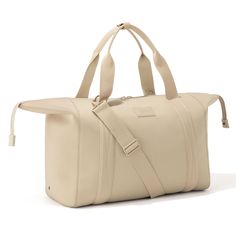 Landon Carryall Duffle Bag | Weekend Bag for Men & Women - Dagne Dover Beige Weekender Bag For On-the-go, Versatile Beige Travel Bag With Adjustable Strap, Beige Large Capacity Luggage For Everyday Use, Beige Large Capacity Everyday Luggage, Versatile Beige Duffle Bag For Daily Use, Versatile Beige Travel Bag For Daily Use, Large Capacity Cream Travel Bag For Everyday Use, Functional Beige Shoulder Travel Bag, Everyday Beige Travel Bag With Detachable Strap