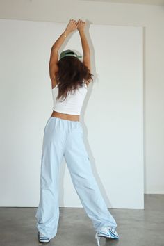 The Lucy Parachute Pant is the perfect pant for when "dressing up" means "dressing down"! Rock these soft-yet-sturdy cargo parachutes for a casual chic look that's as comfy as it is fashion-forward. Easy to pull on, you'll be ready for take-off in no time! Woven with No Stretch Elastic Waist with Drawstring for Easy Pull-On Cargo Pocket Parachute Pant Elastic Cuff at Leg Opening 100% Polyester Model is 5'6 and wearing a size SMALL Spring Relaxed Fit Cargo Bottoms, Spring Cargo Style Relaxed Fit Bottoms, Relaxed Fit Cargo Bottoms For Spring, Sporty Summer Cargo Pants With Pockets, Sporty Summer Cargo Pants With Cargo Pockets, Spring Outdoor Relaxed Fit Cargo Jeans, Trendy Parachute Pants For Loungewear, Trendy Parachute Pants For Loungewear With Pockets, Trendy Loungewear Parachute Pants With Pockets