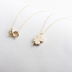 "Real Diamond Gold Clover Necklace, 14K Solid Gold Clover Necklace, Four Leaf Clover Necklace, Gift Necklace, Talisman Necklace, Valentine's Day Gift F E A T U R E S * Made to Order. * Gold KT: 14K * Choice of Gold Color: Yellow Gold, Rose Gold, White Gold * Gem Stone: Genuine Diamond * Diamond-Cut: Round * Diamond Carat: 0.01 ct. * Pendant Height: 11,30 mm / 0.44 inch * Pendant Width: 8,00 mm / 0.31 inch * Diamond Color-Clarity: G.VS Color, SI Clarity * Length: 14\", 16\", 18\", 20\", 22\", 24\" * Setting Type: Bezel Setting * Ready to Ship in 1-3 Business Days * 100% US sourced * 2 Years Warranty * Free Express International Shipping * Free returns within 14 days from the order date We loved making our jewelry with special designs for your special moments. Wishing you to share the joy on Dainty Flower Pendant Jewelry For Good Luck, Dainty Good Luck Jewelry With Flower Pendant, Dainty Yellow Gold Charm Necklace For Good Luck, Dainty Birthstone Jewelry For Good Luck, Good Luck Pendant Jewelry For Mother's Day, Elegant 14k Gold Necklaces For Good Luck, Elegant 14k Gold Necklace For Good Luck, Elegant Personalized Necklaces For Good Luck, Elegant Personalized Good Luck Necklaces