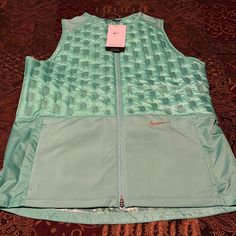 New! Womens Nike Therma Fit Adv Light Down Packable Vest. Light Green Color Way. Womens Size Medium Bust 20 Length 26. Full Zip With Two Hand Pockets. Pristine Condition. See All Photos Nike Vest Jacket, Nike Vest, Nike Therma Fit, Light Green Color, Light Down, Womens Nike, Nike Green, Nike Running, Nike Jacket