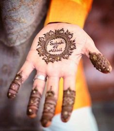 a woman's hand with henna on it and the words, supple is