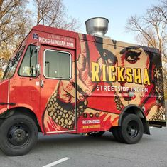 a food truck parked in a parking lot