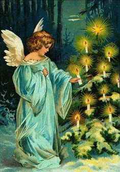 an angel decorating a christmas tree with lit candles