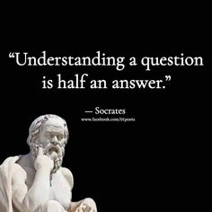 a statue with a quote on it that says,'understanding a question is half an answer? '