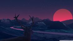 a deer standing on top of a snow covered hillside under a red sun with mountains in the background