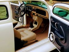 the interior of an old car is clean and ready for us to use in its new home