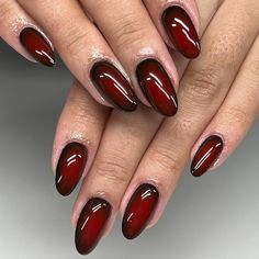 This stunning design features a rich, deep red gradient that transitions smoothly to black at the tips. The glossy finish enhances the depth of the colors, making this manicure a perfect choice for autumn evenings.   Photo credit by: @nailedbyjerri Aura Nails Burgundy, Deep Red Halloween Nails, Gel Inspo Nails, Burgundy Aura Nails, Moody Fall Nails, Autumn 2024 Nails, Red Nails 2024, Dark Red Ombre Nails, Brown And Red Nails