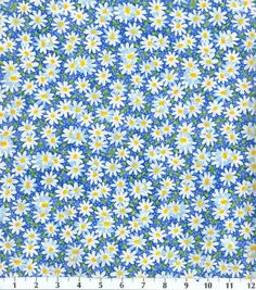 a blue and white flowered background with yellow centers