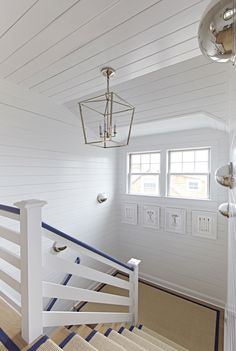 the stairs in this house are painted white