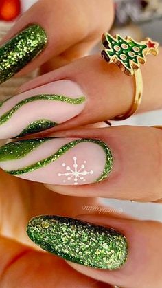 15 Christmas Nails Trendy Styles – Get Ready to Dazzle! 💅 Get ready to shine this holiday season with these Christmas Nails Trendy styles that everyone is raving about! From classic Christmas Nails Acrylic to stunning Christmas Gel Nails, there\'s a look for every occasion. 🎅✨ Looking for festive December Nails or sleek Winter Nails Acrylic? We\'ve got you covered. Embrace the holiday spirit with Xmas Nails and creative Christmas Nail Designs that will take Her Nails to the next level. Try Re... Green Glitter Nail Art, Green Glitter Nails Christmas, Green Glitter Nail Designs, Green And Silver Christmas Nails, Christmas Nails2022, Green Glitter Christmas Nails, Grinch Nails Designs, Grinch Nails