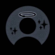 a circular object with stars on it in the dark