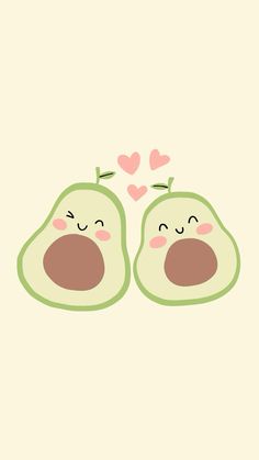 two avocados with faces and hearts in the middle, one has eyes closed