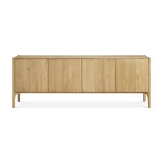 the sideboard is made from wood and has three doors, two drawers and one door