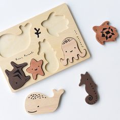 wooden puzzles with sea animals on them