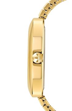 A golden case and matching bracelet create a clean, monochromatic style for this Trefoil-detailed watch marked by stick indexes on a wide, easy-to-read dial. Deployant clasp closure Quartz movement Stainless steel with goldtone ionic plate Imported Classic Gold Watches With Subdials, Gold Business Jewelry And Watches With Round Dial, Gold Minimalist Watch Accessories For Formal Occasions, Gold Jewelry And Watches With Round Dial For Business, Gold Minimalist Watch Accessories For Business, Gold Jewelry And Watches With Polished Finish For Business, Gold Minimalist Watch For Everyday Use, Gold Minimalist Watch With Metal Dial, Minimalist Gold Watch With Metal Dial