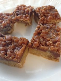 several pieces of food on a white plate