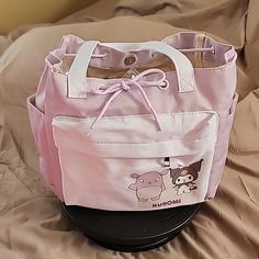 This Tote Bag Has A Lot Of Room Inside. It Has A Draw String Around The Opening To Make It Tighter. It Is Purple And White. It Does Have A Zipper Pocket On The Front. Purple Tote Bag, Purple And White, Womens Tote Bags, Color Purple, Zipper Pocket, Tights, Make It, Womens Sizes, Tote Bag