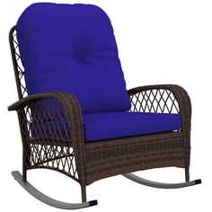 a wicker rocking chair with blue cushion on an isolated white background for use in furniture design