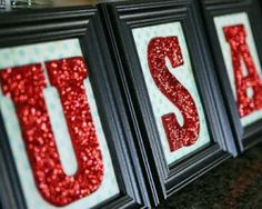 two framed pictures with the word usa spelled in red glitter