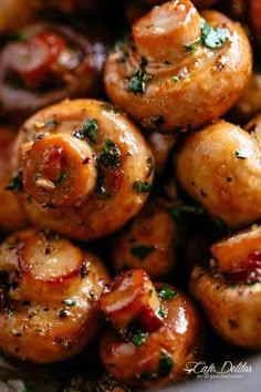 closeup of bacon wrapped mushrooms with parsley