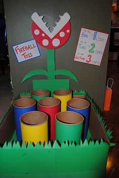 a cardboard box filled with lots of different colored cups