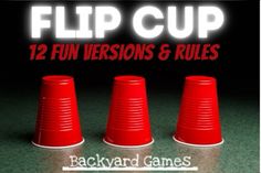 three red cups sitting next to each other with the words flip cup on them in front of them