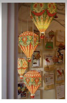 colorful lanterns are hanging from the ceiling