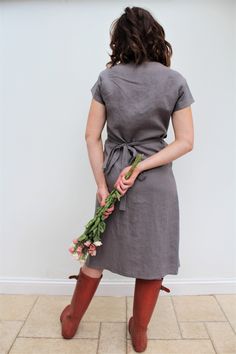 Our love of linen continues with this lovely linen wrap dress. Made in light weight Grey linen fabric, which has been prewashed giving a soft feel. With its flattering sleeves and the all essential Voy side pocket. This will quickly become one of your go-to dresses, and will find it really useful both for work and play! A capsule wardrobe must for the coming season! Length is below knee to mid-calf. Handmade in our studio to order Easy care as you can hand/machine wash. Linen used is Oeko Tex ce Linen Wrap Dress, Gray Linen, Dresses Uk, Side Pocket, Find It, Our Love, Mid Calf, Capsule Wardrobe, Linen Fabric