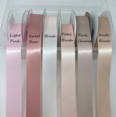 five different colors of satin ribbon in a box with labels on them that say, sweet blush, pink, peach, and champagne