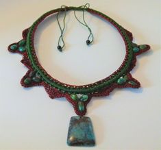 For your consideration is the pictured item a NEW Handmade Crocheted Artisan Necklace Choker Genuine Gemstones-  Chrysocolla Adjusts to fit anyone. Just use the beads...The pendant measures 1 1/2 x 1 1/4 inches.  Please note that I do not accept returns. Ask questions and look carefully at the pictures. I combine items for shipping and will refund over payment of shipping on multiple items. Thanks for looking! Free shipping applies to US only. Artisan Necklace, Necklace Choker, Choker, Choker Necklace, Beads, Gemstones, Pendant, Free Shipping