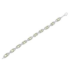 Classy and feminine, this green amethyst and diamond tennis bracelet is designed especially for your lady love. Styled in remarkable sterling silver this bracelet is embellished with 10 alluring prong set cushion cut green amethyst accentuated by 10 brilliant round cut diamonds in prong setting. Fastens with a secure clasp. Total diamond weight is 1/20 ctw and each cushion cut green amethyst measures 7x7 mm. Bracelet Tennis, Diamond Tennis Bracelet, Tennis Bracelet Diamond, Green Amethyst, Diamond Fashion, Amethyst Stone, Tennis Bracelet, Round Cut Diamond, Cushion Cut