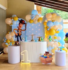 a birthday party with balloons and decorations