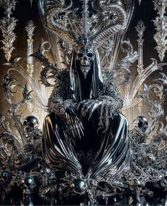 an elaborately designed chandelier in black and silver